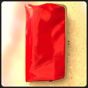 Brand new Hobobags red “Lauren” clutch
